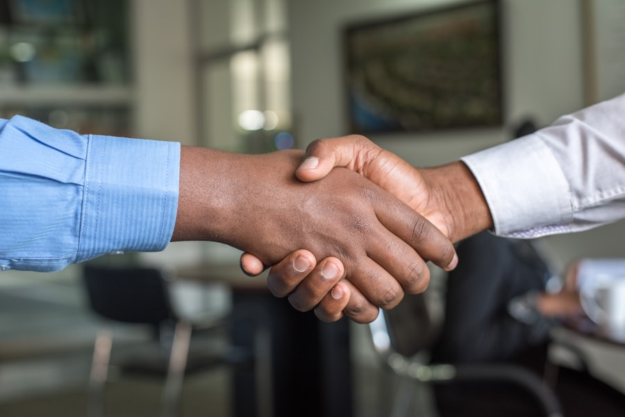 Business handshake closing a supplier deal